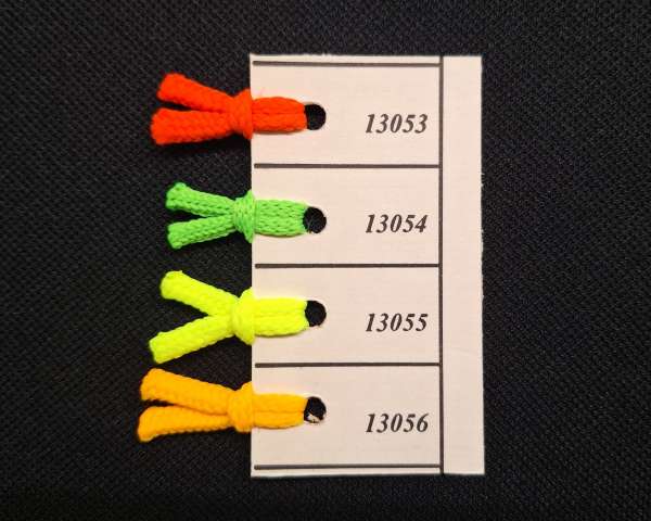 Musterkarte UV-Leuchtschnur mit je einem Muster in Neon-rot, Neon-gelb, Neon-grün, Neon-orange